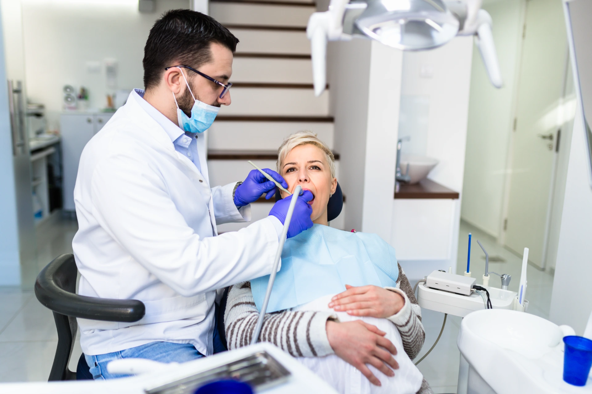 Young pregnant woman having dental treatment